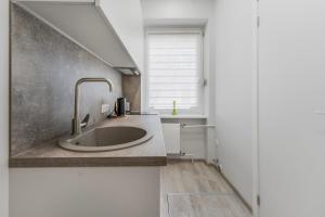 Centrinis butas šalia senvagės