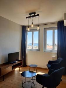 Maisons d'hotes Chambres d'hotes - Bed and Breakfast Les Palmiers : photos des chambres