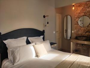 Maisons d'hotes Chambres d'hotes - Bed and Breakfast Les Palmiers : photos des chambres