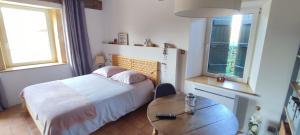 B&B / Chambres d'hotes La Coquille, chambre douillette aupres d-un elevage d-escargots : photos des chambres