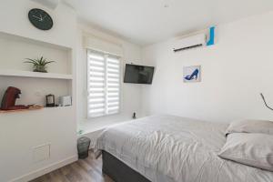 Appartements Mauricette, tout confort avec climatisation : photos des chambres