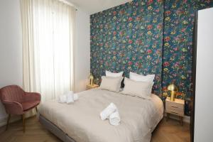 LE LYNX HAUSSMANIEN appartement tout confort, climatisé avec parking privé, à deux pas du centre