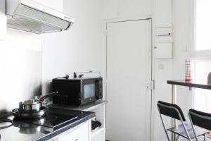 Appartements Charming T1 at the gates of Paris : photos des chambres