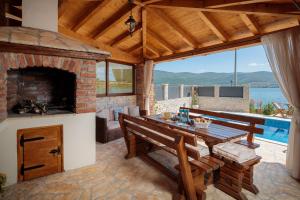 Beachfront villa Noa with heated pool