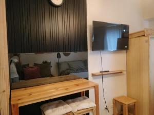 Cozy Wooden Design Studio Condo Unit at Studio 7 Edsa