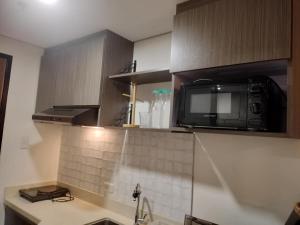 Cozy Wooden Design Studio Condo Unit at Studio 7 Edsa