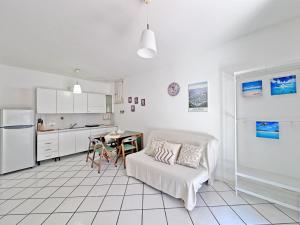 128 - Bilocale a Marcelli al Villaggio Rosa con portico e giardino, climatizzato - SPIAGGIA inclusa nel prezzo