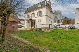Appartements Le Saint-Caprais - Studio a 30min dOrly : photos des chambres