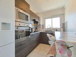 Appartements Appartement T2 climatise avec balcon et parking a La Londe - FR-1-826-1 : photos des chambres