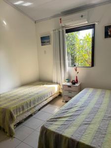 Aconchegante Village Pé na Areia