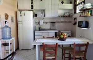 Aconchegante Village Pé na Areia