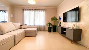 Deu Praia Beach House: Praia, Piscina e Diversão