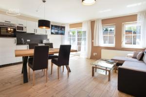 Traumhaftes Appartement mit Terrasse - Odins Blick Wohnung 11 - ruhige Lage mit Privatstrand, Sauna - Apartments, Lobbe