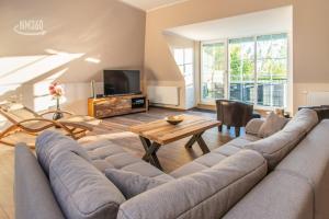 Suite ODINS HALLE - Odins Blick Wohnung 8 - direkt am Privatstrand, Sauna, Garten