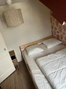 Appartements la parenthese cabourgeaise : photos des chambres