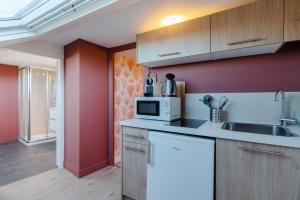 Appartements la parenthese cabourgeaise : photos des chambres