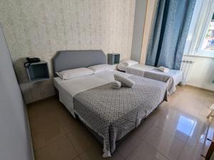 Triple Room room in Hotel Soggiorno Athena