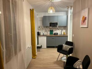Appartements Studio - Proche Centrex & Disneyland : photos des chambres