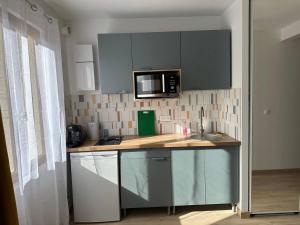 Appartements Studio - Proche Centrex & Disneyland : photos des chambres