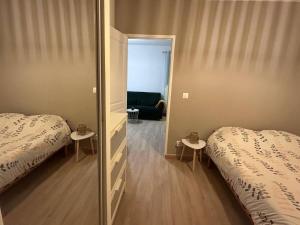 Appartements 4 personnes - Proche Centrex et Disneyland : photos des chambres