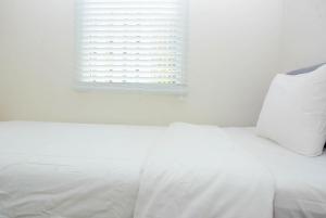 Best and Relax 2BR Springlake Summarecon Apartment By Travelio