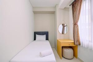 Elegant and Comfy 3BR Transpark Cibubur Apartment By Travelio