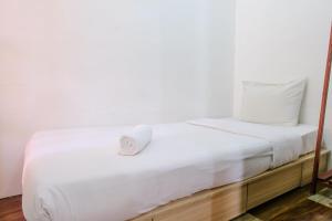 Cozy 2BR at Jarrdin Cihampelas Apartment By Travelio