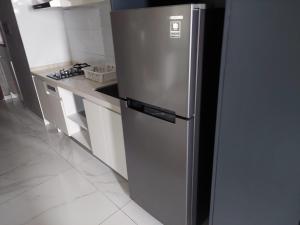 Well Furnished and Cozy 2BR Sky House BSD Apartment By Travelio