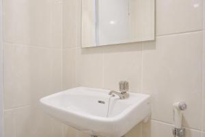 Cozy and Simply Look 2BR Apartment at M-Town Residence By Travelio