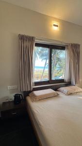 Palm Gardens Beach View Villa