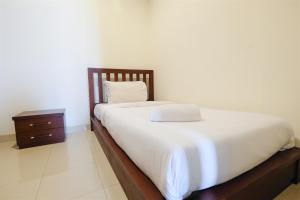 Spacious 2BR Bellezza Apartment By Travelio