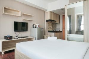 Simply Studio Room Apartment Margonda Residences 5 By Travelio