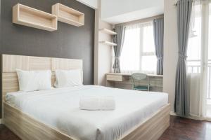Simply Studio Room Apartment Margonda Residences 5 By Travelio