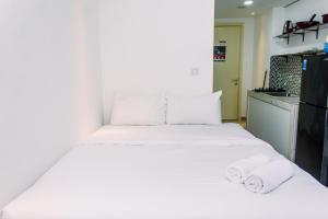 Cozy and Fancy Studio Apartment at M-Town Residence By Travelio