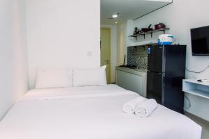 Cozy and Fancy Studio Apartment at M-Town Residence By Travelio