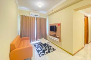 Spacious 2BR with Working Room at Grand Palace Kemayoran Apartment By Travelio