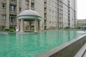 Spacious 2BR with Working Room at Grand Palace Kemayoran Apartment By Travelio