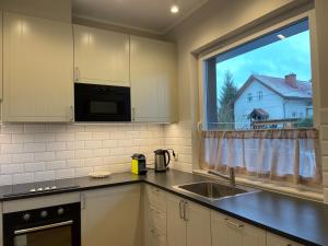 Modern terraced apartment with green garden