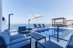 Overlooking Pool, Mountain and Sea 6BR Villa with Two Assistant Room, Private Pool, BBQ Facility Al Dana Island, Fujairah by Deluxe Holiday Homes - Qidfi‘