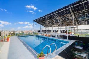 Palette by CheckIn Goverdhan Villas Formerly The White Fresco