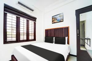 Super Hotel O Attukal Near Attakulangara Formerly Remya Residency
