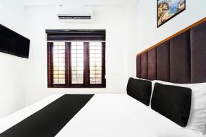 Super Hotel O Attukal Near Attakulangara formerly Remya Residency