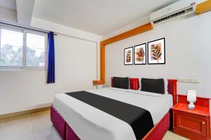 Hotel O Kottayam Near Caritas Hospital