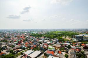 Simply Good Studio Room Apartment at Springlake Summarecon By Travelio