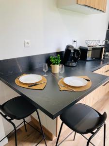 Appartements Le Petit Saintonge - Cour Privee : photos des chambres