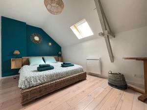Maisons de vacances Le So Wild, maison avec jardin clos, terrasse amenagee, 5 mn a pied commerce, terrain de tennis, a 800 m de la plage d'Omaha beach jeux arcade, jouets, materiel jeunes enfants enfants, table ping-pong : photos des chambres