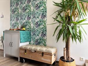 Maisons de vacances Le So Wild, maison avec jardin clos, terrasse amenagee, 5 mn a pied commerce, terrain de tennis, a 800 m de la plage d'Omaha beach jeux arcade, jouets, materiel jeunes enfants enfants, table ping-pong : photos des chambres