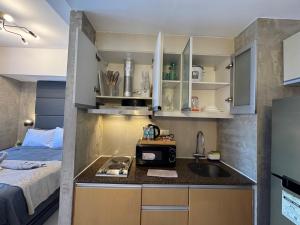 Industrial Chic Studio in McKinley Hill Walk to Venice Mall