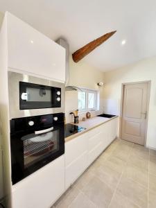 Maisons de vacances Maison au calme - Clim - Wi-Fi - terrasse et cours : photos des chambres