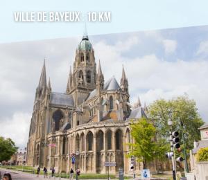 Maisons de vacances Chant des mouettes Maison renovee spacieuse tout confort grand jardin belle terrasse amenagee parking 8 personnes 4 sdb 5 wc a 10 mn a pied de la mer Port en Bessin tous commerces restaurants proche Omaha Beach : photos des chambres